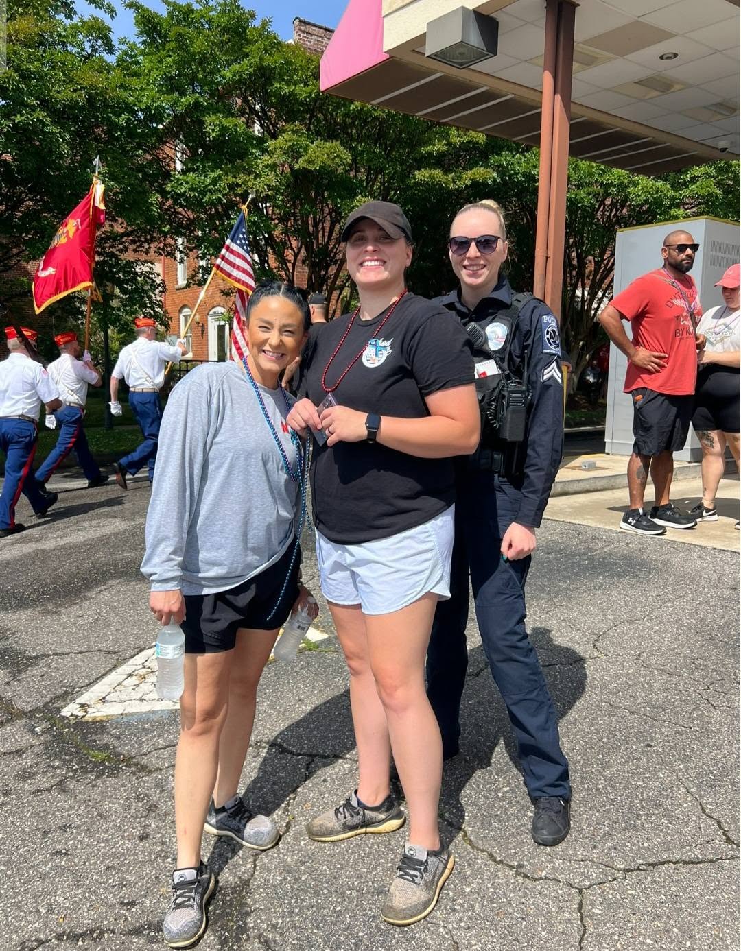A color guard carrying the flag through downtown