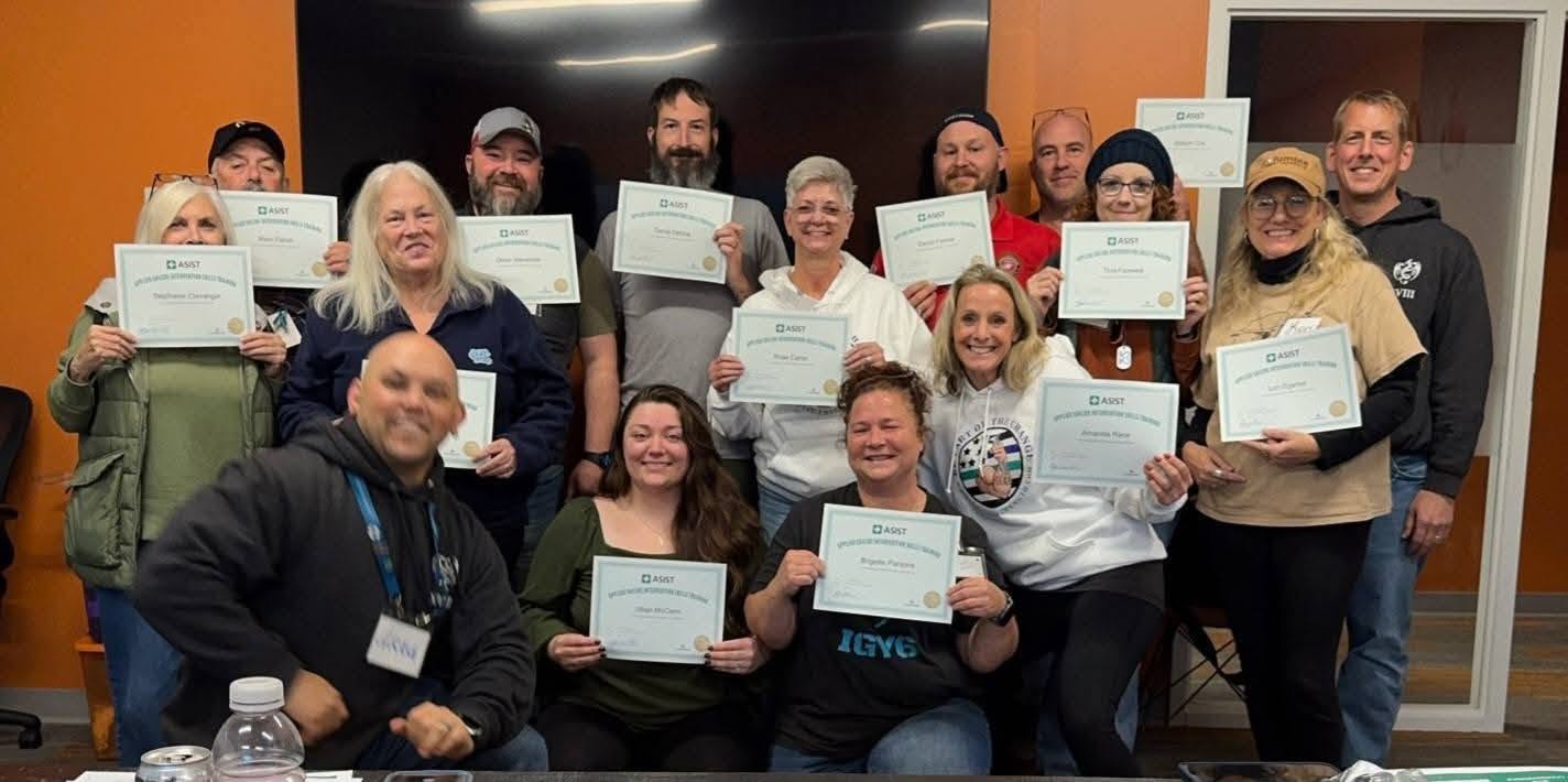 A Let's Talk Strength training class posing with their completion certificates